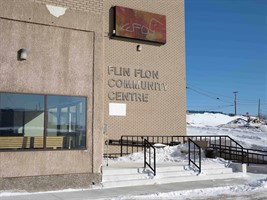 A brick building facade with the sign "Flin Flon Community Centre".